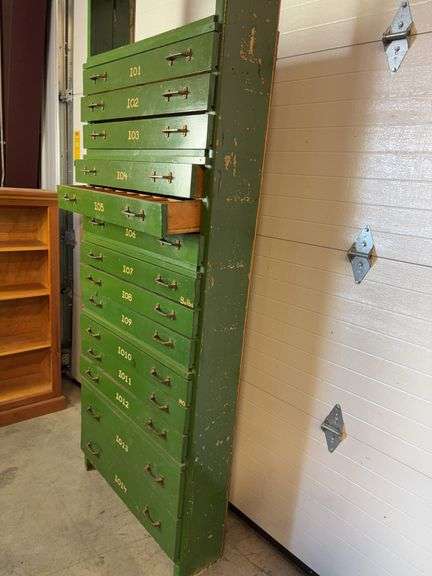 Green organizational stand - 32" wide, 8" deep, and 84" tall