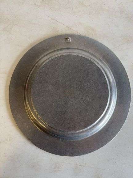 John Deere plate, die-cast model car, and International model tractor