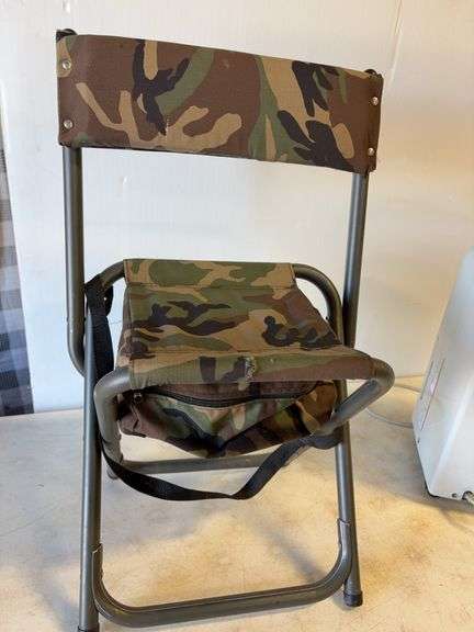 Soleus Air dehumidifier and camo foldable chair
