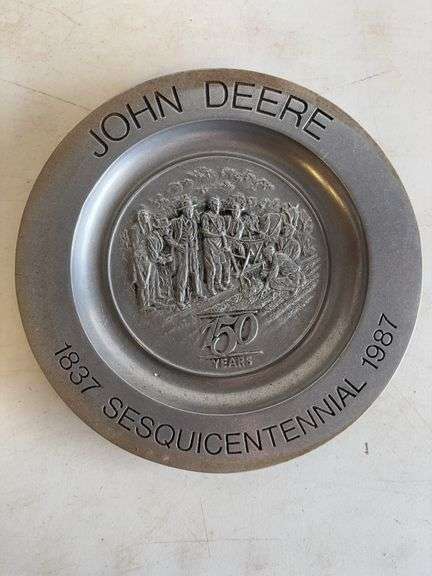 John Deere plate, die-cast model car, and International model tractor