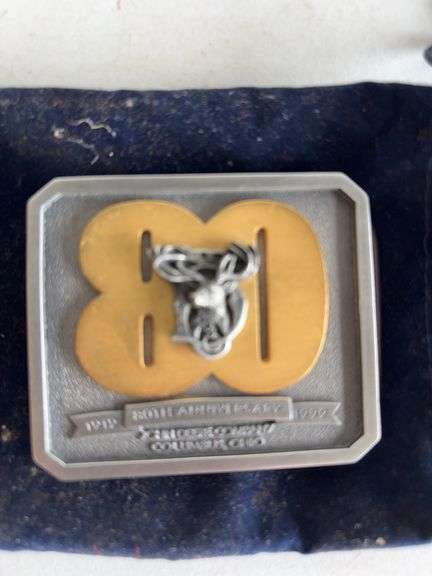 (4) John Deere belt buckles