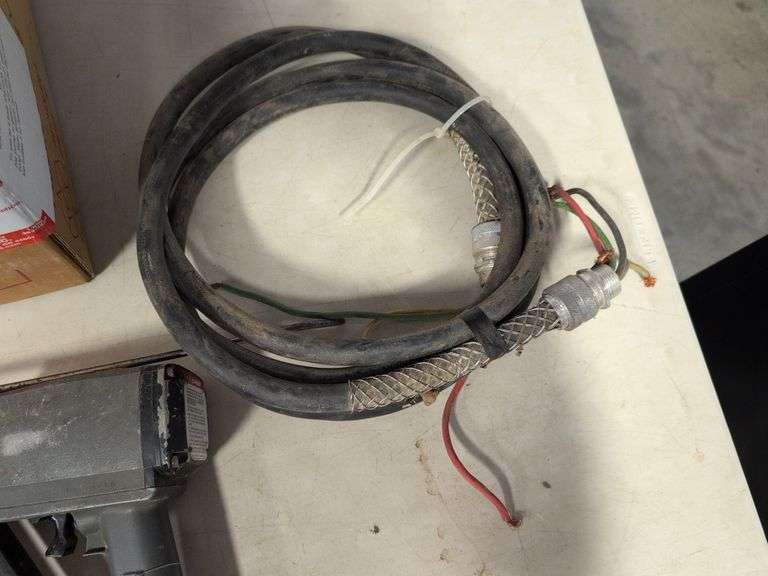 Nail gun, 18" adjustable wrench, and other tools