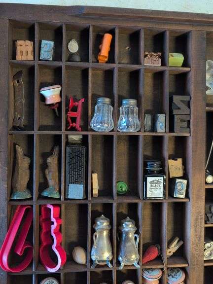 Shadow box with various vintage items - glass figures, print type blocks, and more