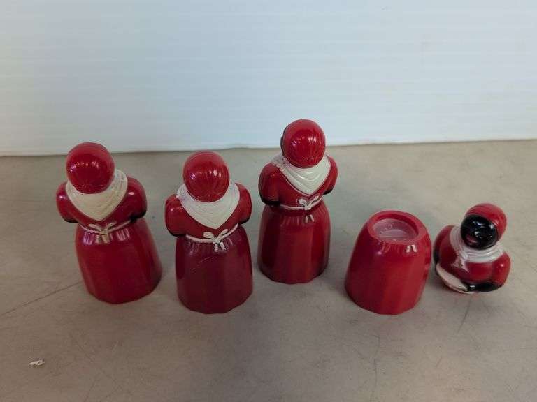 (4) plastic black Americana spice containers