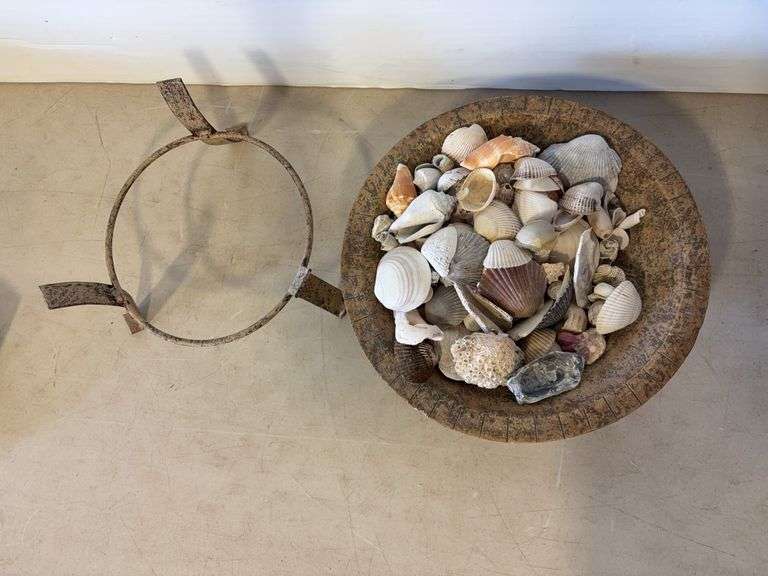 Decorative bowl with stand and shells