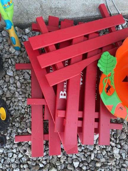 Tonka metal dump truck, (3) aluminum bats, Berlin Flyer wagon rails and misc.