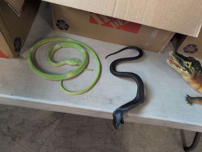 (4) boxes of toy animals