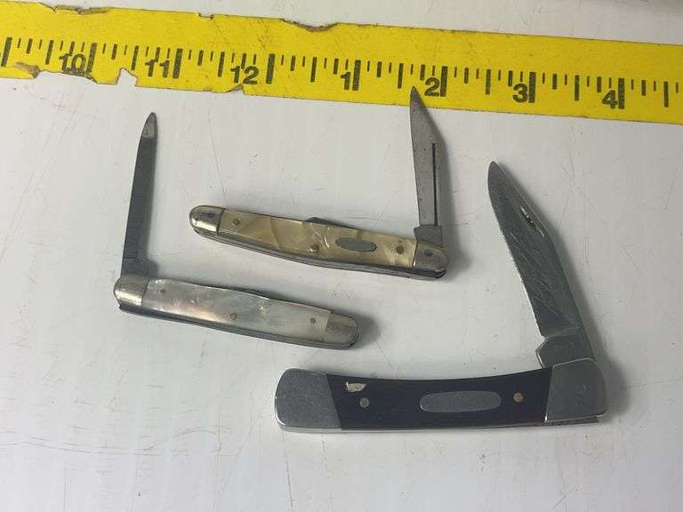 Three Pocket Knives