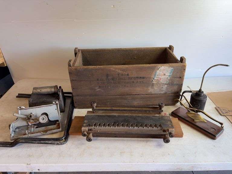 Crate with John Deere oil can, planer, and more