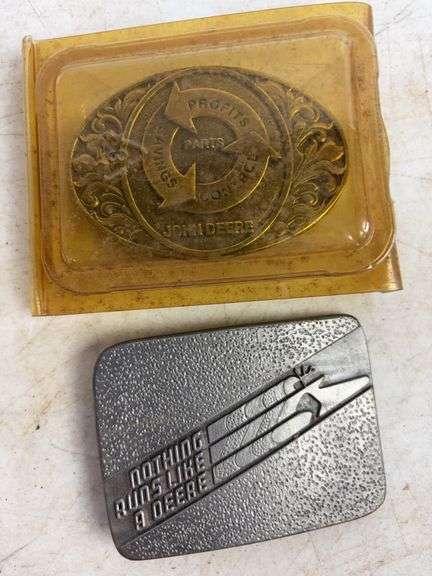 (6) John Deere belt buckles and (2) holiday coins