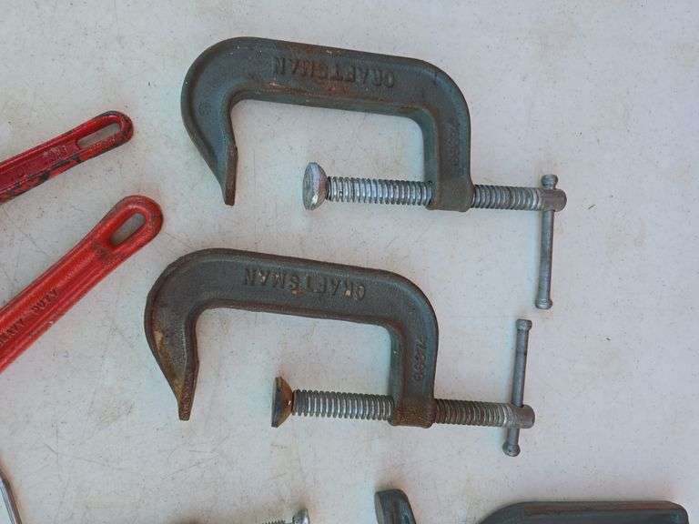 LOT OF PIPE WRENCHES AND C-CLAMPS