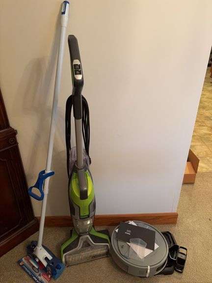 Bissell Pet Pro vacuum, IRobot vacuum, and Mr Clean Roller mop