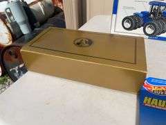 Box of toy tractors/cars/trucks and Ford pocketknife