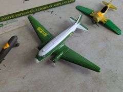 John Deere airplane bank and (2) other metal plane toys