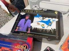 Box of mostly new cars/ toys including hot rod hauler, racing Champions car, BP Chopper Truck and mo