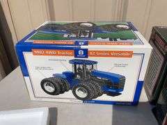 Box of toy tractors/cars/trucks and Ford pocketknife