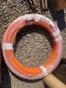 Metal drum, Pex tubing, vacuum hose and Fuller Brikarier brick carrier