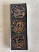 (3) John Deere brass Christmas coins