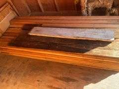 Large pile of wood and misc. tile flooring