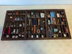 Shadow box with various vintage items - glass figures, print type blocks, and more