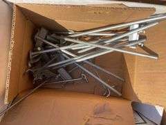 (2) boxes of hooks/shelving, mechanics chair and cord wheel