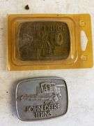 (6) John Deere belt buckles and (2) holiday coins
