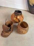 Vases with silk flowers, cups, and more