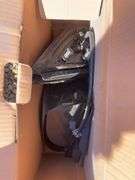 Large lot of misc. items including car seat, Rubbermaid trash barrel, radio parts, jumper cables, hy