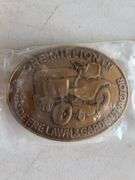 (4) John Deere belt buckles