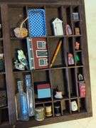 Shadow box with various vintage items - glass figures, print type blocks, and more