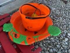 Tonka metal dump truck, (3) aluminum bats, Berlin Flyer wagon rails and misc.