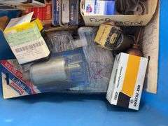 Tote of filters, parts, and more - John Deere, Wix, etc