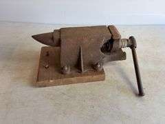 Anvil/bench vise and safety goggles