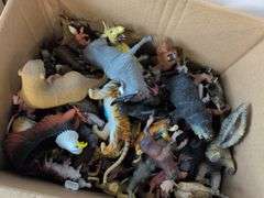 (4) boxes of toy animals