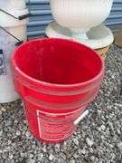 Assortment of buckets, planters and shepherds hook