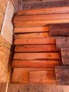 Large pile of wood and misc. tile flooring