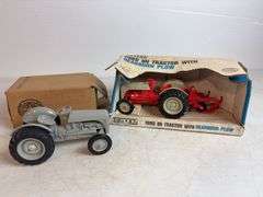 Ford 8N die-cast model tractor with Dearborn plow and other Ford tractor - 1/16 scale, dirty