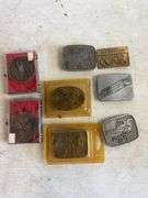 (6) John Deere belt buckles and (2) holiday coins