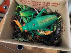 (4) boxes of toy animals