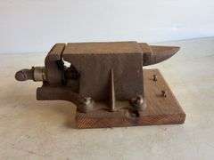 Anvil/bench vise and safety goggles