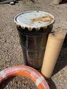 Metal drum, Pex tubing, vacuum hose and Fuller Brikarier brick carrier