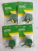 (7) John Deere diecast model toys - (3) forage wagons and (4) round balers