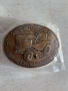 (4) John Deere belt buckles