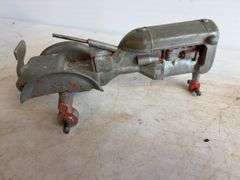 Tote of hand saws and clamps