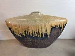 Vases with silk flowers, cups, and more