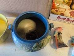 Roseville pottery piece with crack, other pottery, and decor