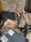 Large lot of misc. items including car seat, Rubbermaid trash barrel, radio parts, jumper cables, hy