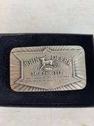 (4) John Deere belt buckles