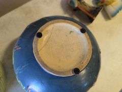 Roseville pottery piece with crack, other pottery, and decor