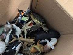 (4) boxes of toy animals